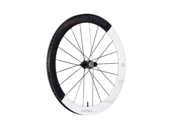 Lún HYPER LIGHT carbon wheel, two-tone deep rim: matte black & speckled white with HYPER branding. Product appearance.